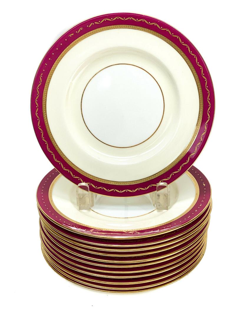 12 Minton England for Tiffany & Co. Porcelain Dessert Plates: 12 Minton England for Tiffany & Co. porcelain 7.75 inch dessert plates, circa 1900. A burgundy red ground to the trim with gilt swags and beaded accents. Minton England Tiffany mark to the underside b