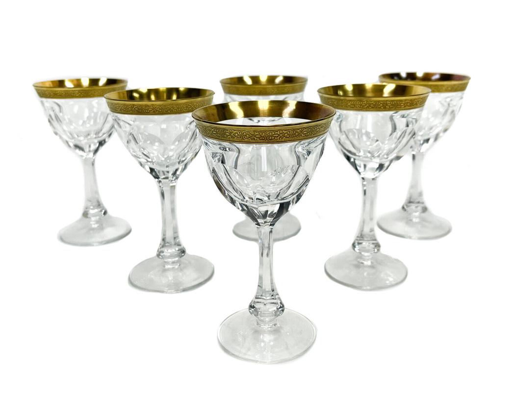 6 Moser Gilt Glass 4 ounce Wine Goblets in Lady Hamilton: 6 Moser glass 4 oz wine goblets in Lady Hamilton. Cut walls with gold encrusted band. Acid etched moser mark to underside base. Weight Approx., 1 lbs Measures Approx., 3.1 inches diameter x 5.5 inches
