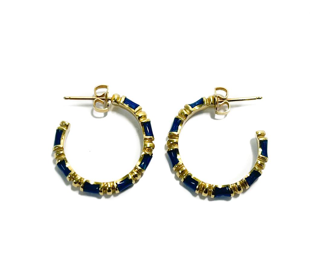 Tiffany & Co. 18k Yellow Gold and Lapis Lazuli Hoop Bamboo Earrings: Tiffany & Co. 18k Yellow Gold and Lapis Lazuli Hoop Bamboo Earrings. Marked "T&CO 18k" to the inner clasp. Weight Approx., 8.5 grams Measures Approx., 0.8 inches diameter Domestic Shipping: $20