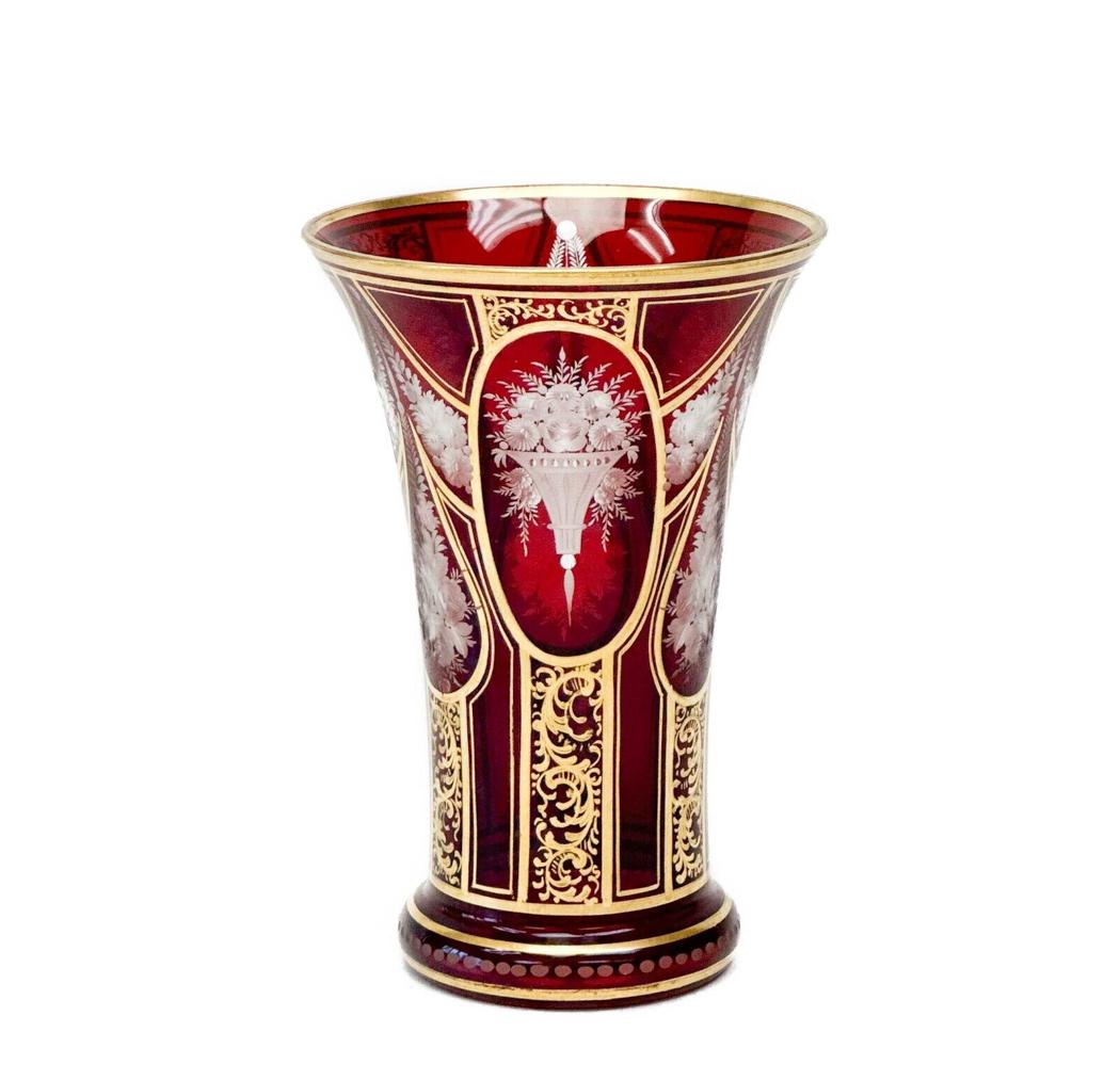Czech Cranberry Red Cut to Clear Glass Vase Intaglio Florals c. 1920: Czech Cranberry Cut to Clear Intaglio Glass Vase. Cranberry glass with intaglio floral decoration, gilt accents. Underside inscribed Czechoslavakia Weight Approx., 1 lb Measures Approx., 4.825 inches 