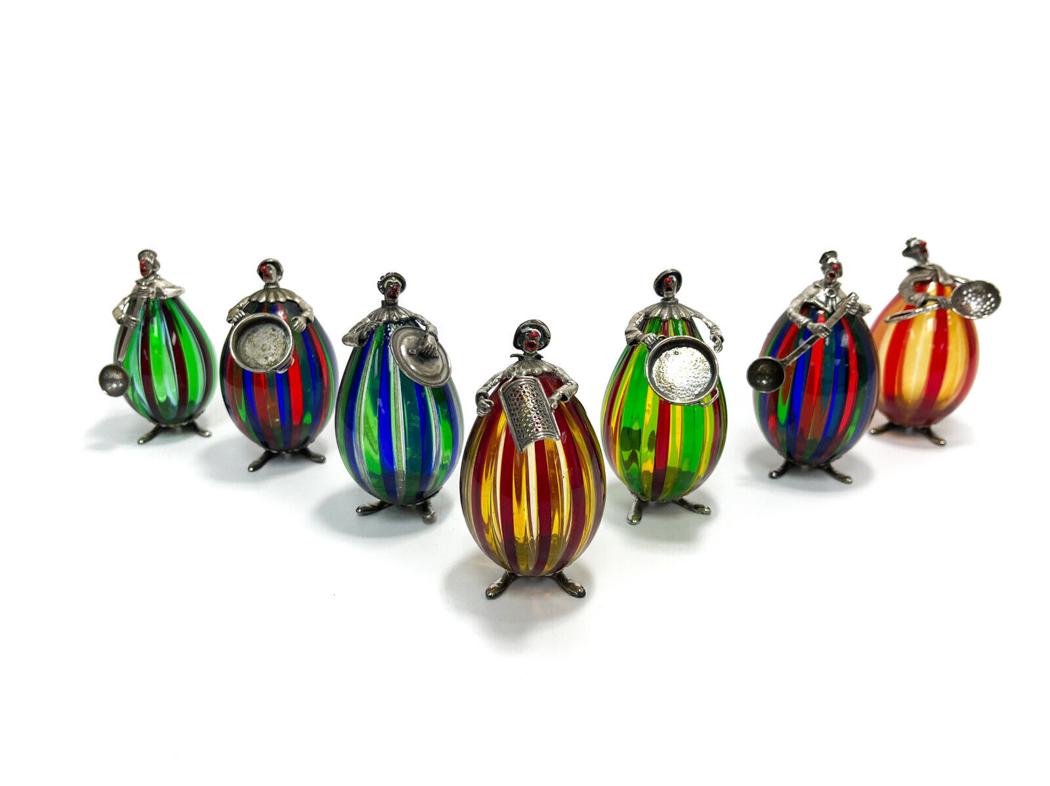 7 Italian silver, enamel and Murano Glass Figurines: A fine group of 7 Italian sterling silver clown figures by Ancini, Arezzo. Hallmarked Ancini with italian silversmith hallmark 1547-AR. Most with orignal stickers. Tallest measures 5.25 inches tall, m