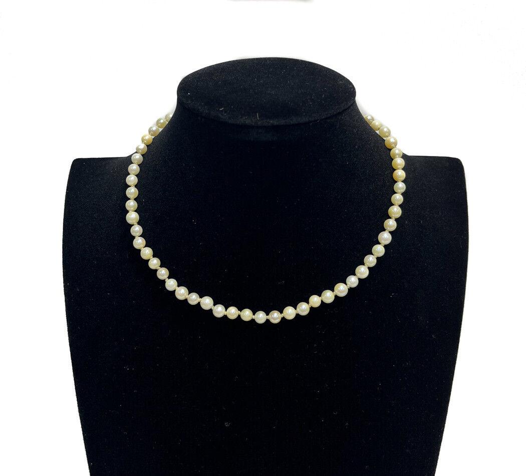 14k White Gold and 5.6mm Cultured Pearl Single Strand Necklace: 14k White Gold and 5.6mm Cultured Pearl Single Strand Necklace. Marked 14k to the clasp. Weight Approx., 14 grams Measures Approx., 14.5 inches length / Pearl: 5.6 mm Domestic Shipping: $20