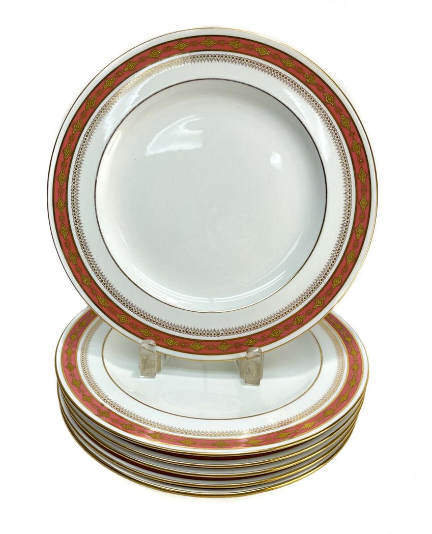 6 Royal Crown Derby England for Tiffany & Co. Porcelain Dinner Plates, 1911: 6 Royal Crown Derby England for Tiffany & Co. porcelain dinner plates, 1911. Coral ground with gilt decoration to the rim. Royal Crown Derby mark to the underside. Weight Approx., 6 lbs Measures Appro