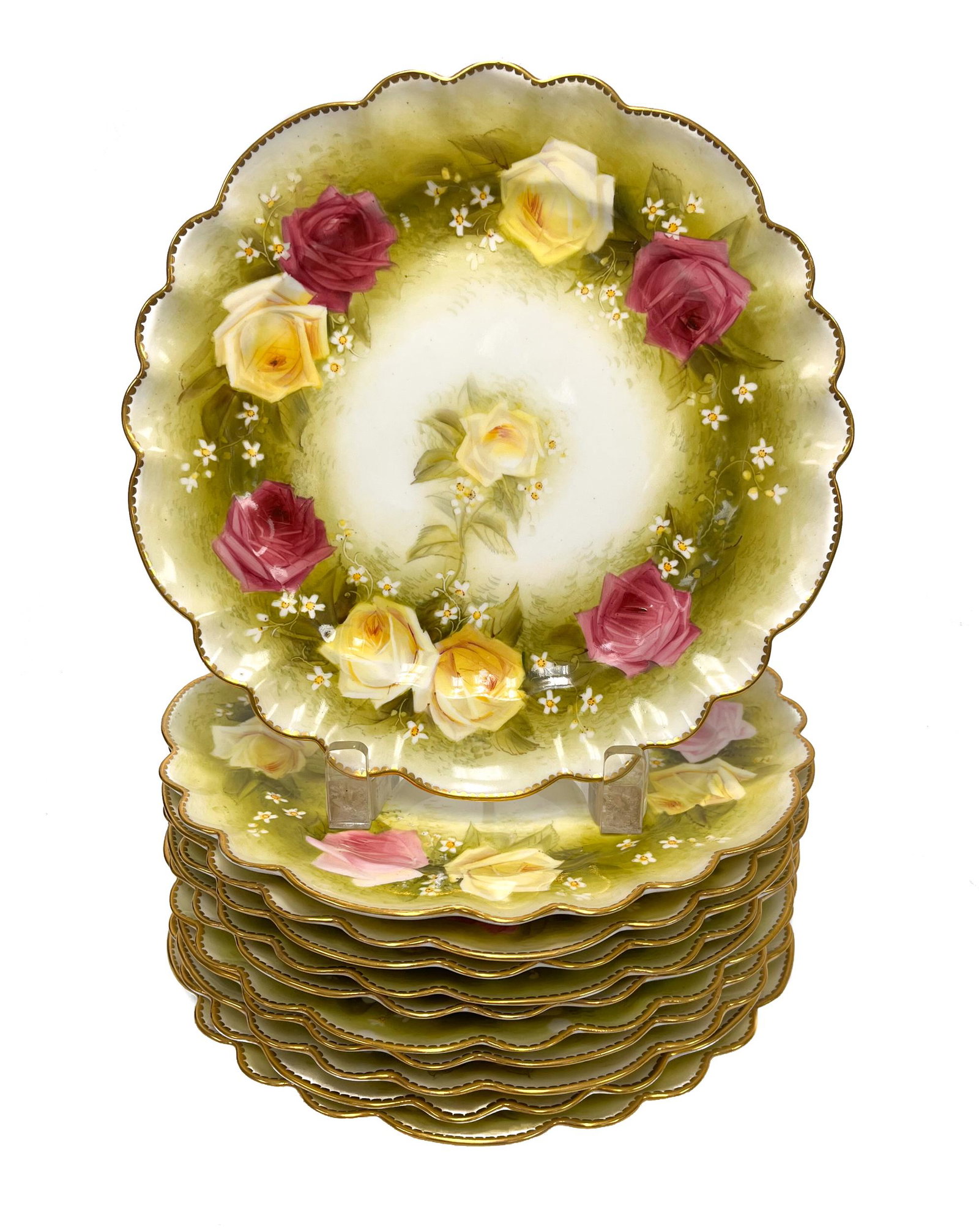 11 George Jones & Sons for Tiffany & Co. Dessert Plates: 11 George Jones & Sons for Tiffany & Co. Porcelain Scalloped Dessert Plates, circa 1930. Hand painted pink and yellow roses with daiseys. George Jones & Sons for Tiffany & Co. Made in England mark to 