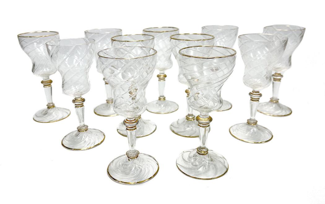 11 Lobmeyr Germany Swirled Glass 6 inch 4 ounce Wine Goblets, Gilt Rims: 11 Lobmeyr Germany swirled glass 4 ounce wine goblets, circa 1900. A continuous swirl pattern from the base to the stem and up to the bowl. With Gilt highlights. Various goblets to the underside with 