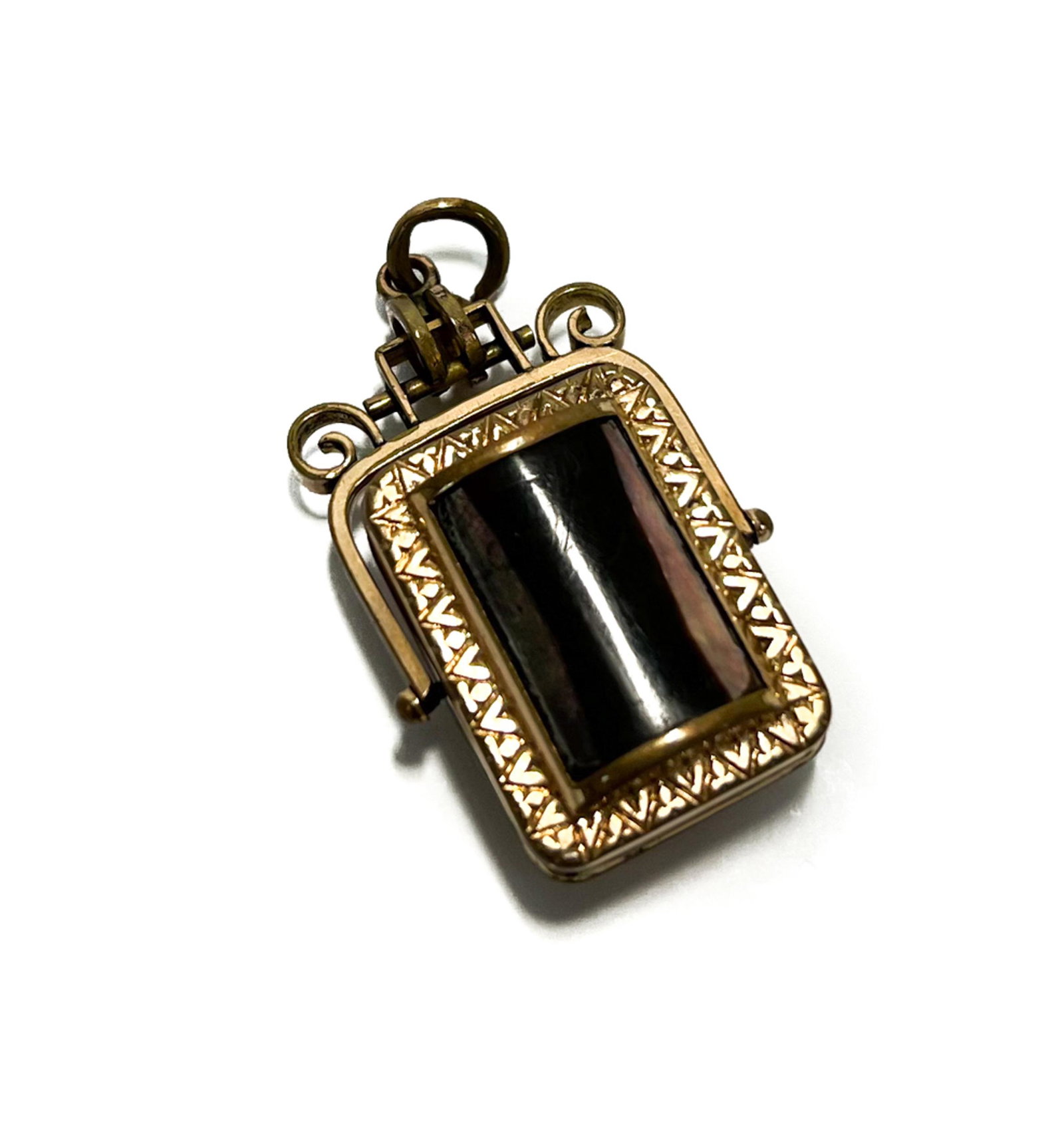 Gilt Metal and Hardstone Foldable Locket Pendant: Gilt Metal and Hardstone Foldable Locket Pendant. Applied hardstones to the ends. Unmarked. Weight Approx., 12.7 grams Measures Approx., 0.75 inches x 1.5 inch (including hinge) x 0.5 inches Domestic 