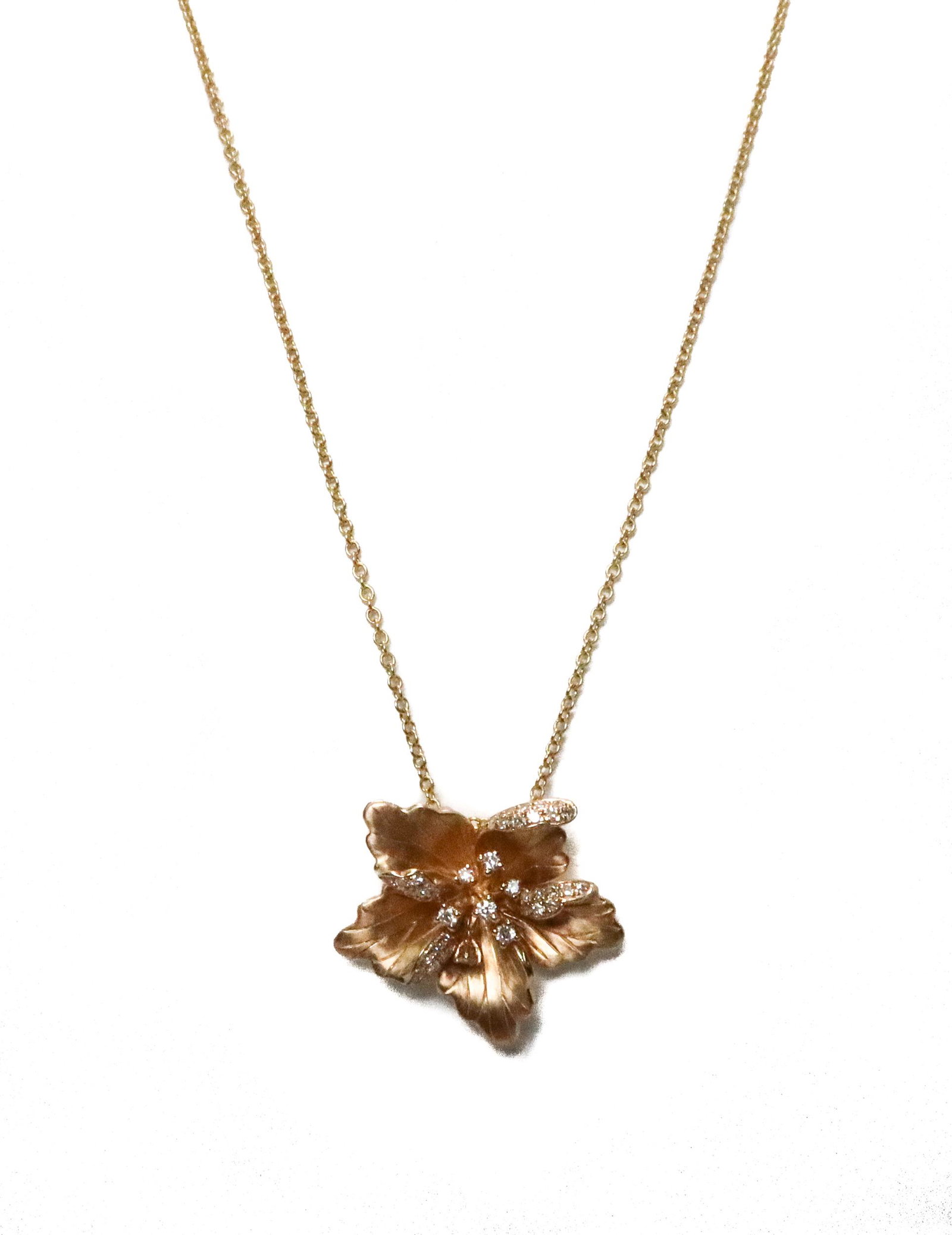 14k Yellow Gold and Diamond Hibiscus Flower Necklace: 14k Yellow Gold and Diamond Hibiscus Flower Necklace. Various sizes of brilliant round cut diamonds to the center of the flower weighing approximately 0.37 carats. Marked "14k EFEY" to clasp. Weight A