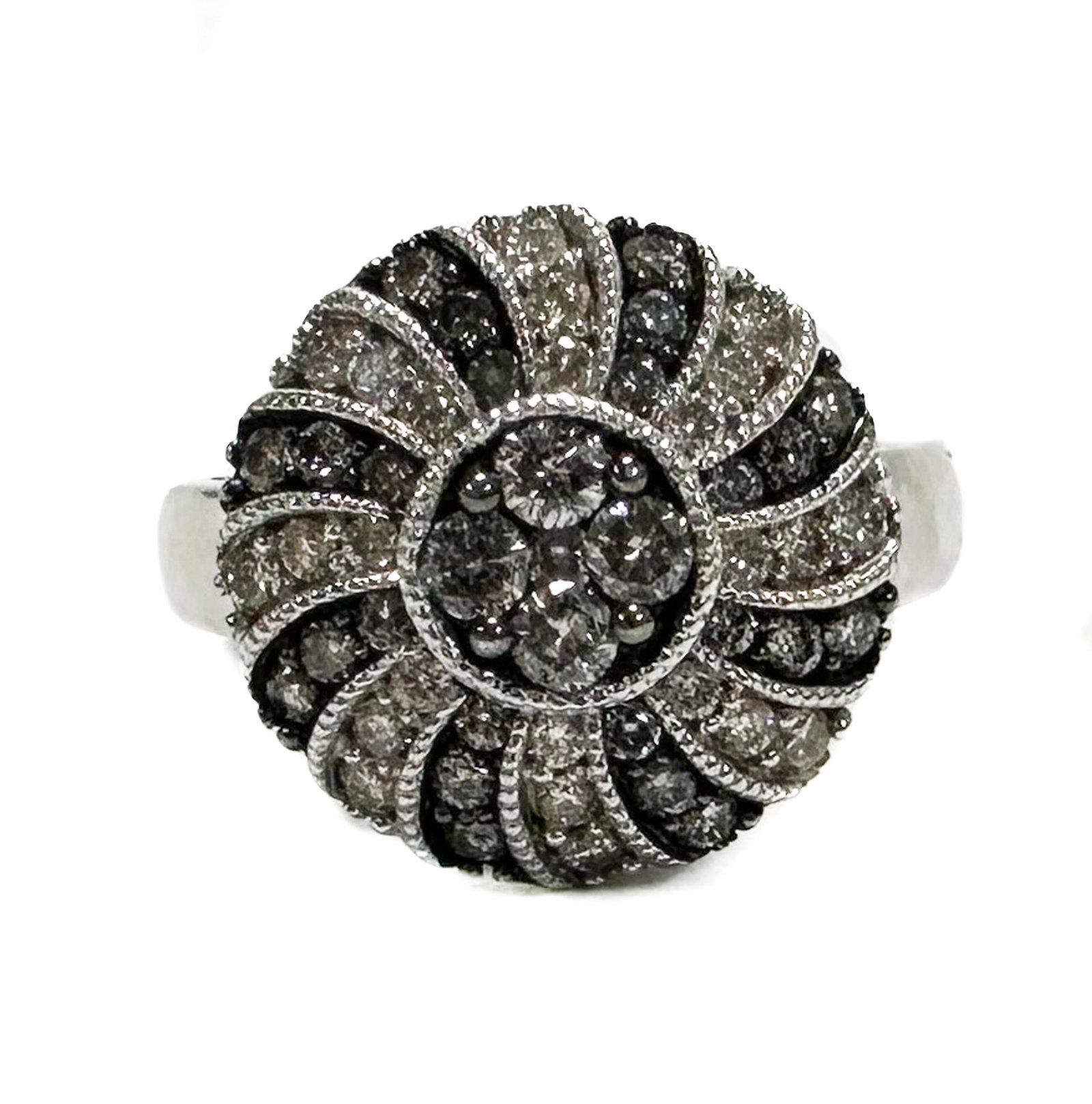 14k White Gold Diamond Swirled Ring: 14k White Gold Diamond Swirled Ring. Swirled Diamonds to the face. Marked "14k" to the inner band. Aprx. .82 carats. Weight Approx., 7.44 grams Domestic Shipping: $20