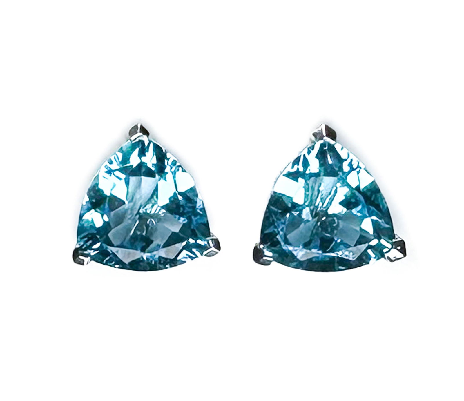 14k White Gold Blue Topaz Triangular Stud Earrings: 14k White Gold Blue Topaz Triangular Stud Earrings. Marked "14k" and "BH" to the backing Weight Approx., 2.22 grams / 4.5 carats Measures Approx., 0.3 inches x 0.3 inches Domestic Shipping: $20