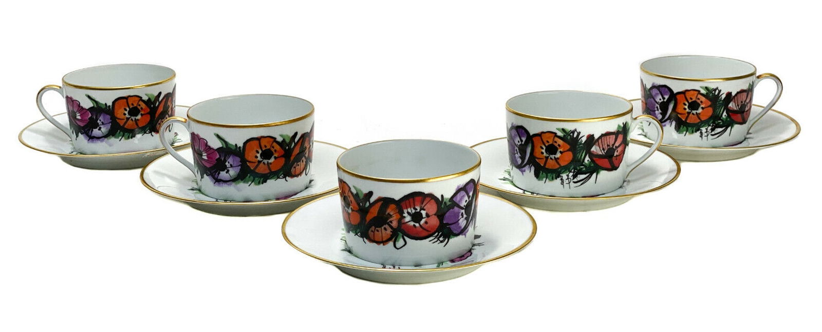 5 Bernardaud Buffet Limoges Large Cup & Saucers in "Les Anemones": 5 Bernardaud Buffet Limoges porcelain large cup and saucers in "Les Anemones". Multi-colored flowers throughout with black outlines. Gilt to the the rims. Signed "B.B." for Bernardaud Buffet with Limo