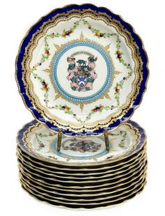 12 Royal Worcester Hand Painted Porcelain 9 inch Armorial Plates, 1909: 12 Royal Worcester hand painted porcelain armorial plates, 1909. Amorial crest featuring a boar, a knight head, leaves, and the motto "Firmus et Fidelis" to center with a light blue band and garlands