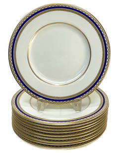 10 Royal Doulton England Porcelain 9 inch Plates, circa 1930: 10 Royal Doulton England Porcelain 9 inch Plates, c1930. Cobalt blue ground to the rims with gilt geometric designs to the edge. Royal Doulton England marks to the underside base. Weight Approx., 8 lb