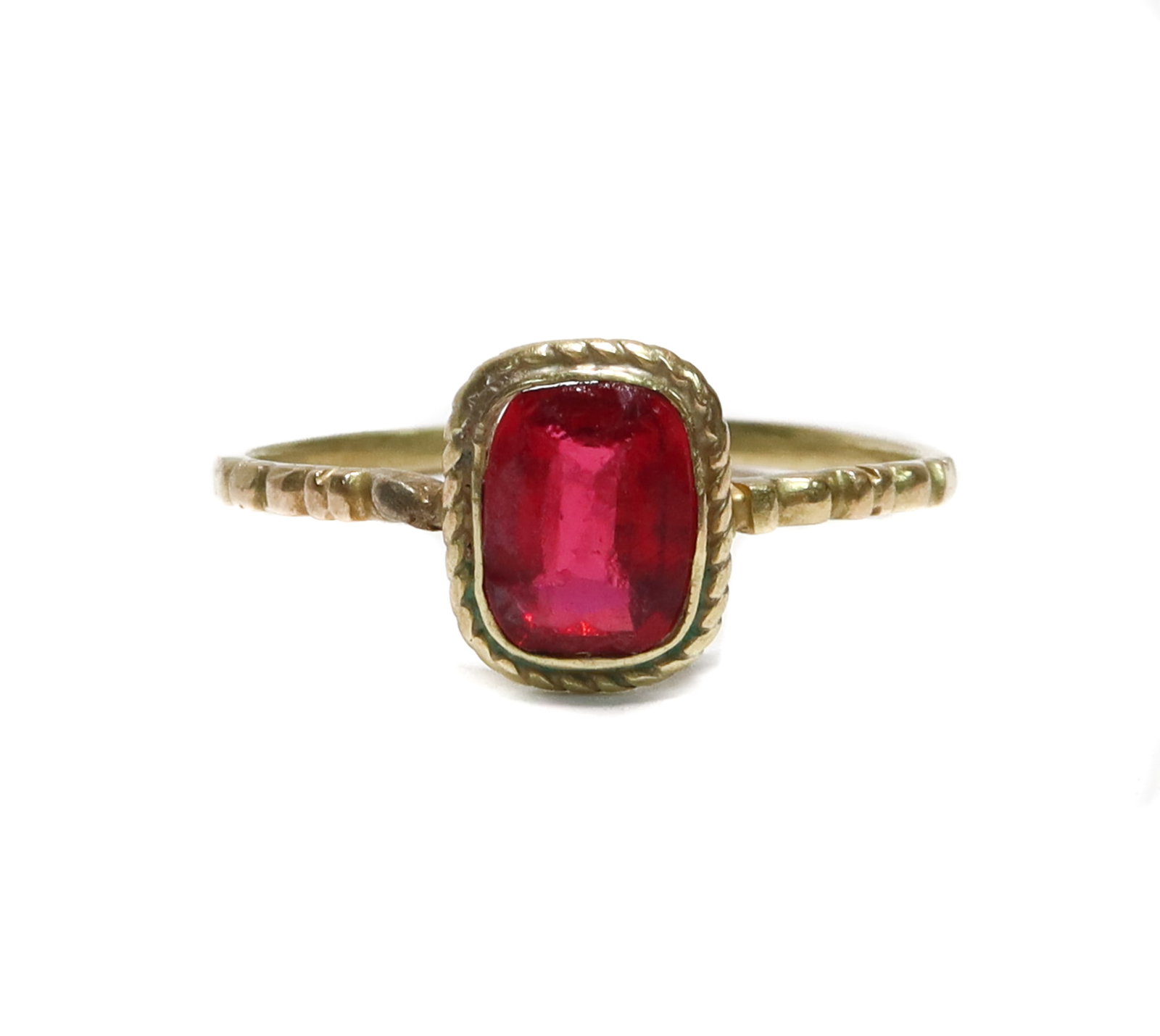 14k Yellow Gold and Garnet Ring, Size 5.5: 14k Yellow Gold and Garnet Ring, Size 5.5. Rectangular cushion cut garnet to the center weighing appproximately 0.55 carats. Unmarked, tests for 14k. Weight Approx., 1.04 grams. Measures Approx., 5.5 