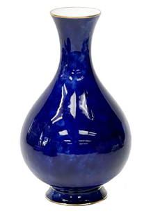 Manufacture de Sevres Cobalt Blue 8.3 inch Miniature Porcelain Vase 1897: Manufacture de Sevres porcelain cobalt blue vase, 1897. A mottled cobalt blue ground, gilt to the rim and base. Underside marked Dore a Sevres 97, Green "S" mark 93. Weight Approx., 1 lb Measures