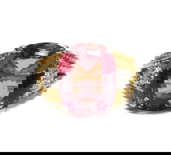 Tiffany & Co. 18k Yellow Gold Pink Tourmaline and Diamond Ring, Size 8: Tiffany & Co. 18k yellow gold pink tourmaline and diamond ring, Size 8 . Yellow gold 4 strand rope band with an elongated rectangular faceted cut pink tourmaline center and two round cut diamonds to e