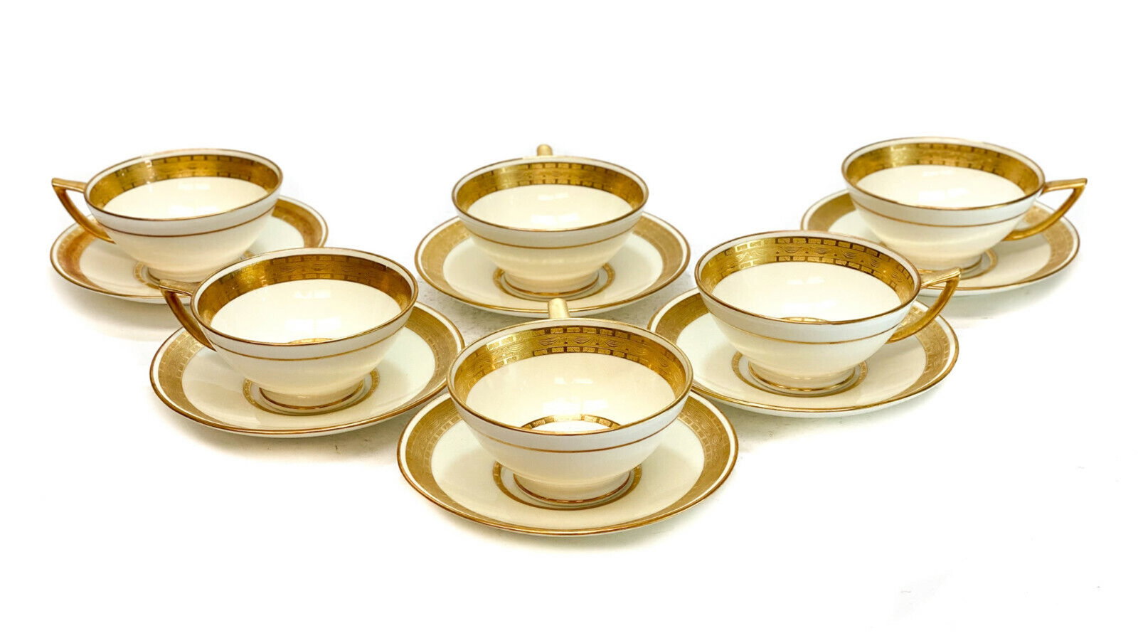 6 Minton England Porcelain Gilt Encrusted Cup and Saucers, circa 1920: 6 Minton England porcelain gilt encrusted cup and saucers, circa 1920, Gilt encrusted swags, foliate scrolls, and florals around the rim. Minton England marks to the underside. Weight Approx., 8 lbs M