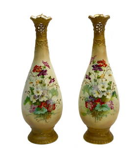 Pair Amphora Ernst Wahliss Austrian Porcelain Vases: Pair Amphora Ernst Wahliss Austrian Turn Wien Vienna hand painted porcelain vases, circa 1910. Hand painted colorful florals to center with gilt accents. Raised decoration to stem, reticulated design
