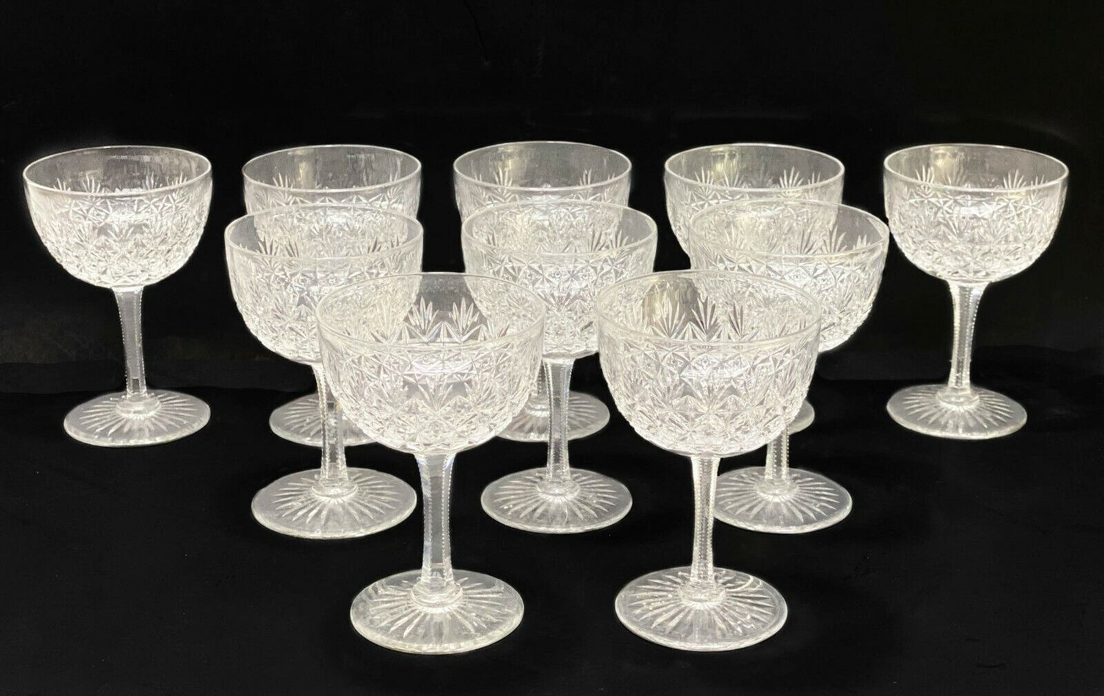 12 Thomas Webb Wellington Cut Crystal Cordial Glasses: 12 Thomas Webb Wellington cut crystal cordial glasses. Cut fan and star design with a star to the underside. Webb mark to underside of two glasses. Weight Approx., 2.5 lbs Measures Approx., 2 inches d