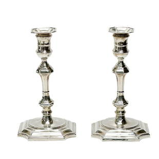 Pair Cartier Sterling Silver Candlestick Holders: Pair Cartier Sterling Silver Candlesticks. Underside marked Cartier Sterling 2633 Cement Filled. Weight Approx., 3.5 lbsMeasures Approx., 5.5 inches x 5.5 inches x 9.75 inches tallDomestic Shipping: