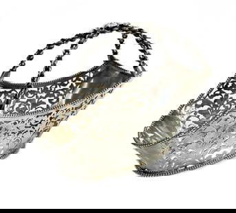 Buccellati Sterling Silver Pierced Wine Caddy: Buccellati Italian sterling silver pierced wine caddy. Pierced leaves to the walls with a beaded rim. Chained handle with a grape leaf center. Buccellati sterling silver marks to the edge. Weight