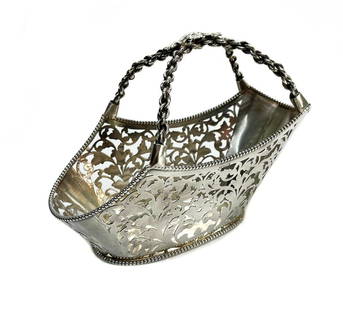 Buccellati Sterling Silver Pierced Wine Caddy: Buccellati Italian sterling silver pierced wine caddy. Pierced leaves to the walls with a beaded rim. Chained handle with a grape leaf center. Buccellati sterling silver marks to the edge. Weight