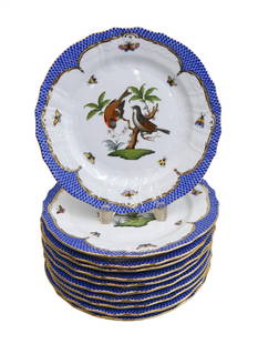 12 Herend Hungary Porcelain Dinner Plates in Rothschild Bird Blue Border, 1948: 12 Herend Hungary Porcelain dinner plates in Rothschild Bird Blue Border, 1948. A blue fish scale border in blue with various hand painted birds and butterflies throughout to the center. Herend Hungar