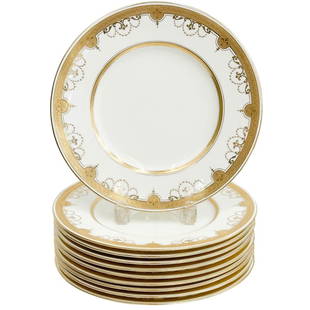 10 Minton England for Tiffany & Co. Gilt Porcelain Dinner Plates circa 1930: 10 Minton England for Tiffany & Co. Gilt Porcelain Dinner Plates. Cream colored ground with ornate gilt decoration with fleur de lis. Underside marked Minton England Tiffany & Co. retailer's marks, im