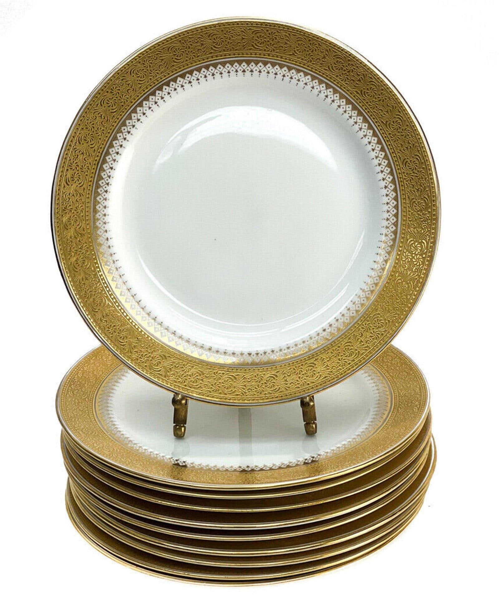 10 Royal Doulton England for Tiffany Dessert Plates: 10 Royal Doulton England for Tiffany & Co. porcelain dessert plates, circa 1910. A gold trim ground with embossed floral decorations. Royal Doulton England mark to the underside. Weight Approx., 4.5 l