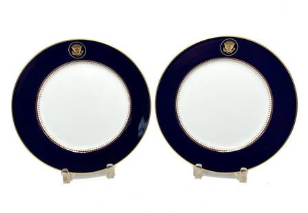 Pair of Fitz and Floyd Reagan White House Dinner Plates: Pair of Fitz and Floyd Fine China porcelain White House Service dinner plates by Robert C. Floyd, 1983. A cobalt blue ground and gilt Great Seal of the United States to top central rims. Gilt accents