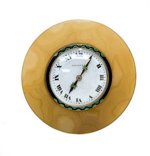 Tiffany & Co. 18k Gold Agate Enamel Diamond Art Deco Clock: Fine Tiffany & Co. Art Deco desk clock circa 1930. Consisting of a carved round agate frame, mounted to an 18k gold and enamel bezel clock. Gold and enamel hour and minute handa with diamonds set to t