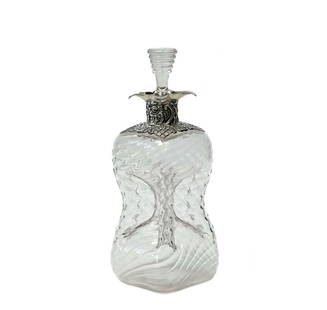 Victorian William Comyns & Sons England Sterling Silver Mounted Glass Decanter: Victorian William Comyns & Sons England sterling silver mounted glass decanter, 1897. Swirl design to glass and four pinched sections. Ornate sterling silver foliate and floral overlay to the top. Eng