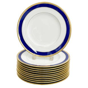 11 Minton England for Tiffany & Co Porcelain Dinner Plates Cobalt Blue 1923: 11 Minton England for Tiffany & Co Porcelain Dinner Plates. A cobalt blue ground to the edge with gilt decoration to the rim. Underside with Minton for Tiffany & Co. marks, Minton impressed date