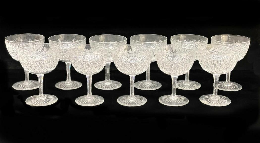 11 Thomas Webb Wellington Cut Crystal Wine Glasses: 11 Thomas Webb Wellington Cut Crystal Wine Glasses. Cut fan and star design with a star to the underside. Weight Approx., 4 lbs Measures Approx., 3.375 inches diameter x 4.5 inches tall.Domestic Shipp