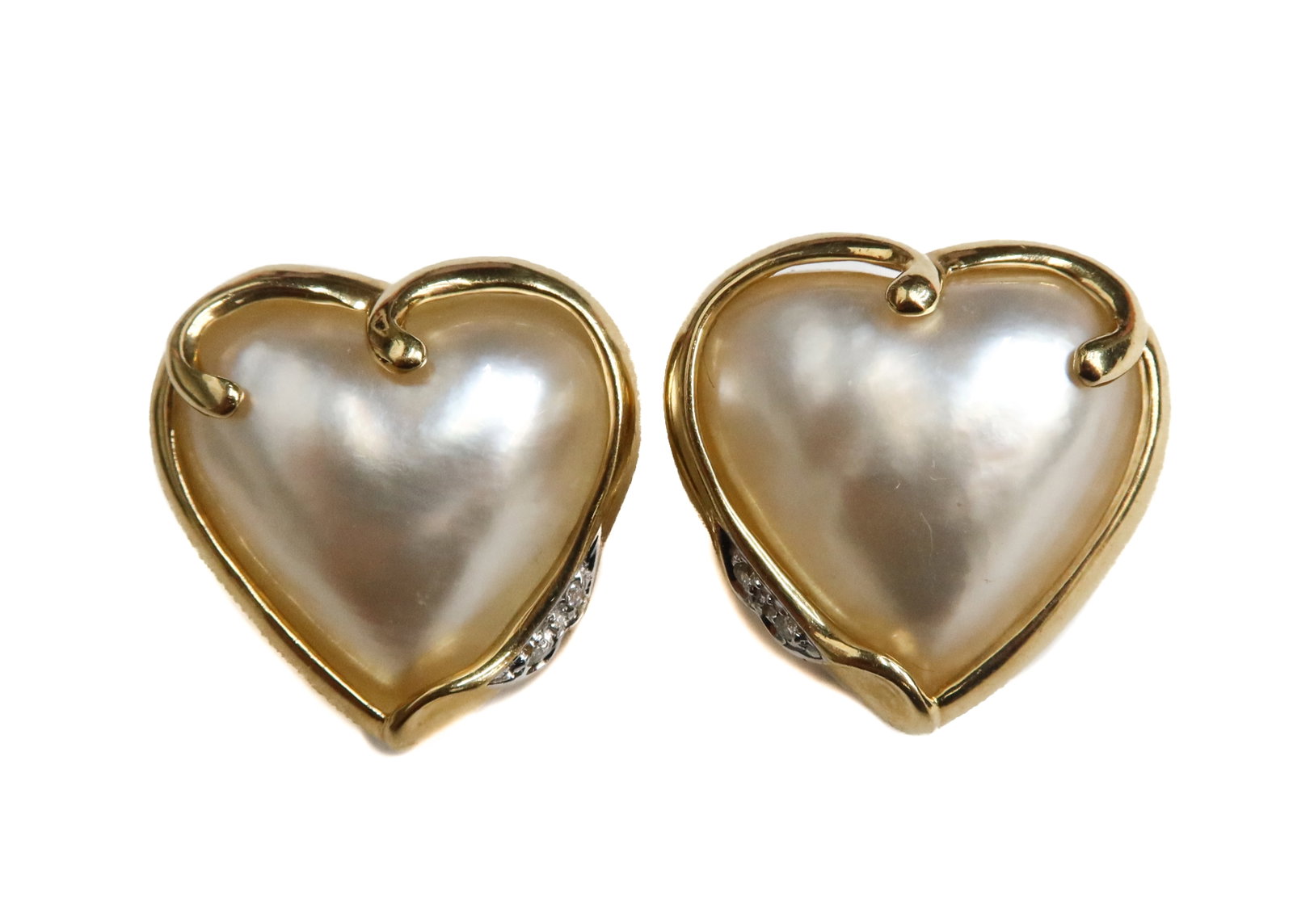 14k Yellow Gold and Heart Mother of Pearl Earrings: 14k Yellow Gold and Heart Mother of Pearl Earrings. Heart shaped mother of pearl with round cut diamond gold frame backing. Marked "14k" to backing with an indistinguishable maker mark. Weight Approx.