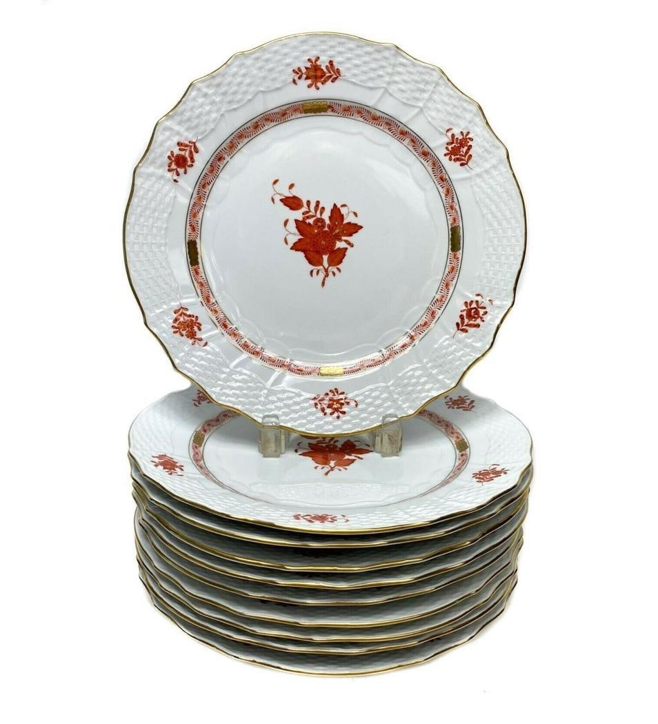 10 Herend Chinese Bouquet Service Plates in Rust: 10 Herend Chinese Bouquet Service Plates in Rust.10 Herend service plates decorated with rust-colored flowers in the middle and around outer rim of plate with three flowers on the underside. Weight Ap