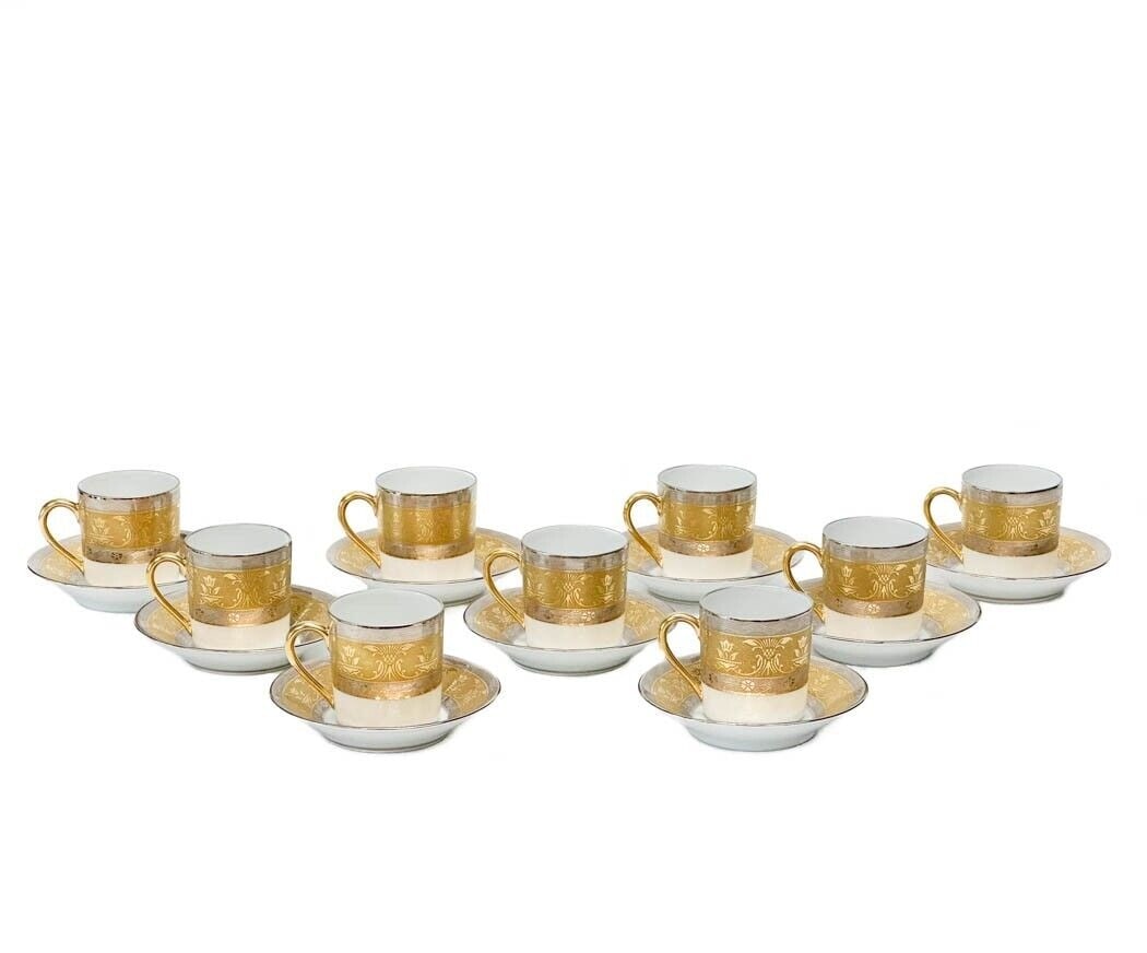 9 Christofle France La Paiva Gilt & Platinum Porcelain Demitasse Cup & Saucers: 9 Christofle France porcelain demitasse cups and saucers in La Pavia. A white ground to center, gilt to the edge and with platinum bands to the rim with floral designs. Gilt to rims and handles. Each