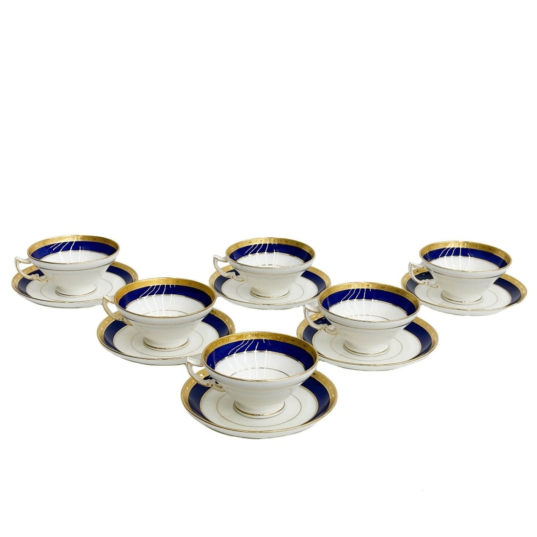 6 Minton England for Tiffany & Co Porcelain Tea Cup and Saucers circa 1920: 6 Minton England for Tiffany & Co Porcelain tea Cup and Saucers. A cobalt blue ground to the edge with gilt decoration to the rim. Underside with Minton for Tiffany & Co. marks, Minton impressed date