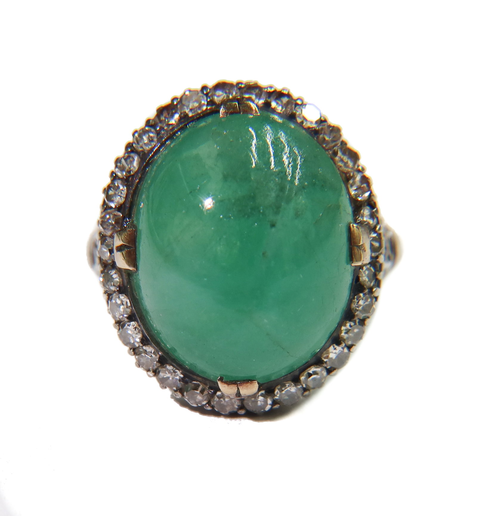 14k Yellow and White Gold Chrysophrase and Old Mine Cut Diamond Ring, Size 7.5: 14k Yellow and White Gold Chrysophrase and Old Mine Cut Diamond Ring, Size 7.5. Oval Cabochon chrysophrase to center with 30 old mine cut diamonds to the halo. Tests for 14k gold. Weight Approx., 5.58