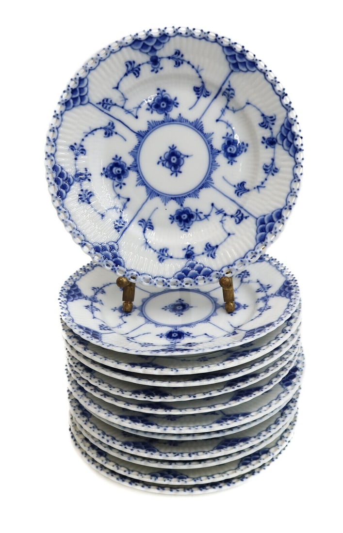12 Royal Copenhagen Porcelain Blue Fluted Full Lace Bread Plates #1088 1st Qual: 12 Royal Copenhagen Porcelain Blue Fluted Full Lace bread plates #1088. Fluted porcelain with a delicate blue floral design. Full lace border. Royal Copenhagen marks to the underside with date marks r