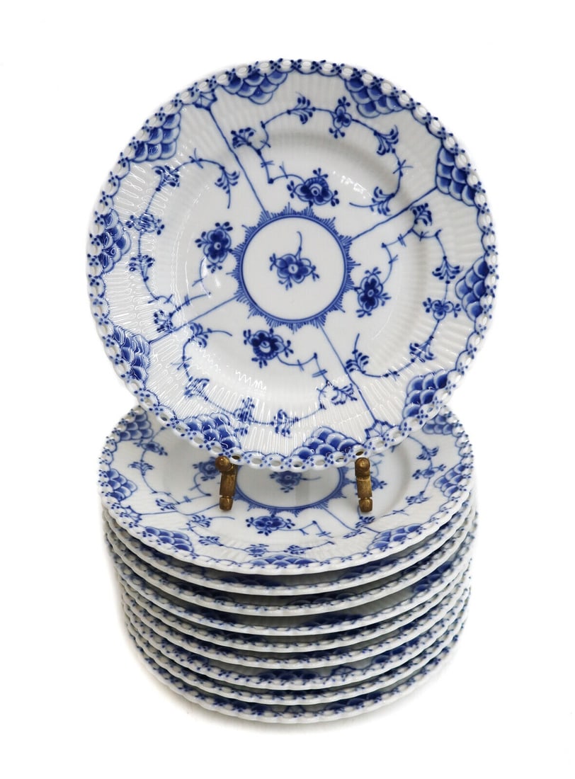10 Royal Copenhagen Porcelain Blue Fluted Full Lace Dessert Plates #1087: 10 Royal Copenhagen Porcelain Blue Fluted Full Lace Dessert Plates #1087. Fluted porcelain with a delicate blue floral design. Full lace border. Royal Copenhagen marks to the underside with date marks