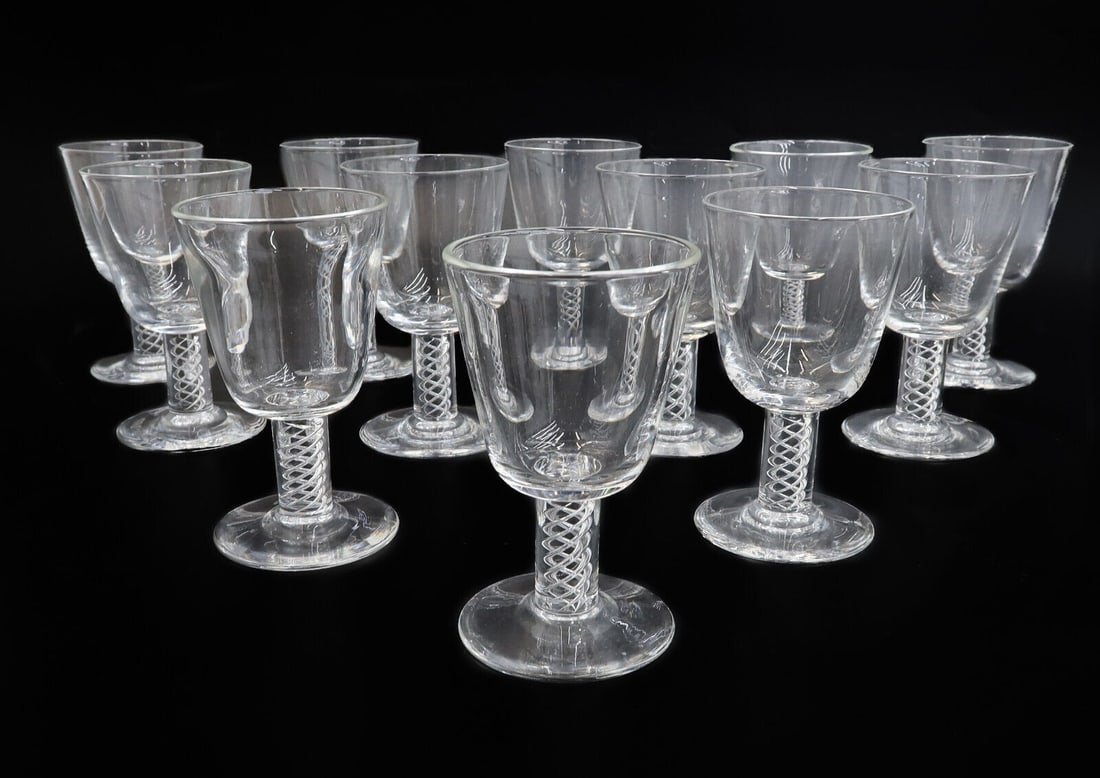 12 Steuben Glass Air Twist Wine Goblets, Signed, Original Box and Dustbag: 12 Steuben Glass Air Twist Wine Goblets, Signed. Twisted air design to the stem, with a polished pontil. Steuben signature to underside of foot. With dust bags and original box. Approximate weight: 12