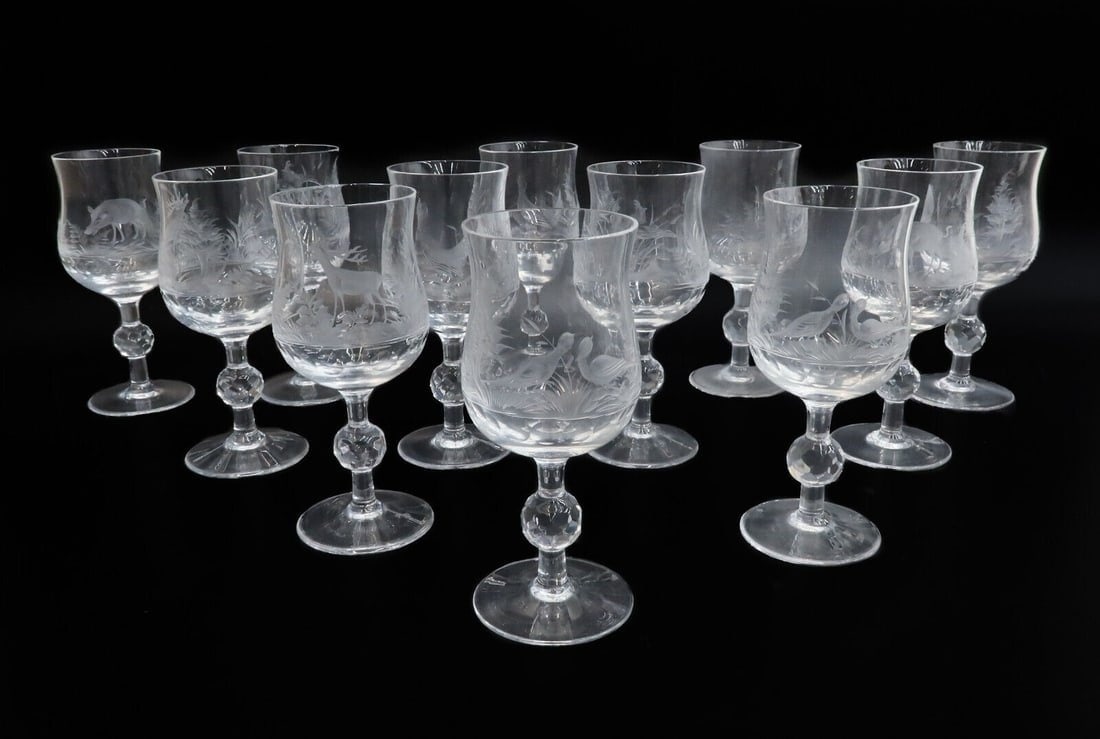 12 German Kaspar Bleikristall Copper Engraved Glass White Wine Goblets, c. 1940: 12 German Kaspar Bleikristall Mundgeblasen Handgesch copper wheel engraved glass white wine goblets, circa 1940. Copper wheel engraved American wildlife scenes to center. Weight Approx., 8 lbs Measure