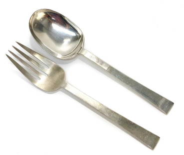 International Sterling Silver Serving Fork & Spoon: Pair International sterling silver serving fork and spoons, Starlit Pattern. A modernist design similar to Allan Adler's Starlit pattern. International sterling silver marks to the underside. Weight A