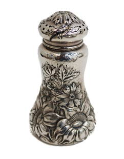 Simon's Brothers Sterling Silver Repousse Muffineer #1501, circa 1900: Simon's Brothers Sterling Silver Repousse Muffineer #1501, circa 1900 Repousse florals to exterior and slightly hand hammered. Simon's Brothers sterling silver marks to underside. Weight Approx.,3.8 o