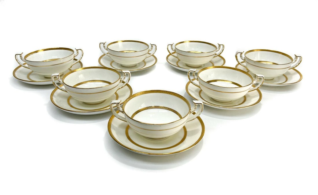 7 Minton England Porcelain Bouillon Bowls & Underplates, circa 1920: 7 Minton England porcelain bouillon bowls & underplates, circa 1920. Gilt bands to the top and central band. Minton England mark to the underside base. Approximate weight: 2 lbs Measurements: Approx.,