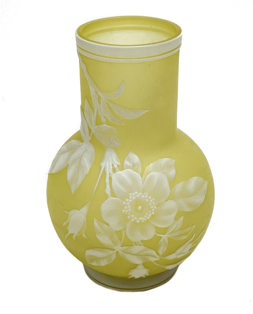 Thomas Webb Cameo Glass White Enamel Vase: Thomas Webb cameo white enamel vase, circa 1900. A yellow ground with white flowers throughout. Unmarked. Weight Approx., 1 lbs Measures Approx., 3.5 inches diameter x 5.25 inches tall.Domestic Shippi