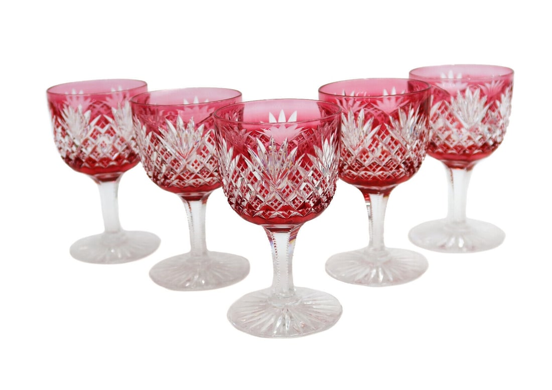 5 Cranberry Red Cut to Clear Glass Wine Goblets Crosshatch Cut Fans: 5 Cranberry red cut to clear glass wine goblets. Fans and crosshatch pattern to exterior bowl and starburst base. Approximate weight: 2 lb Measurements: Approx., 2.75 inches diameter x 4.5 inches tall