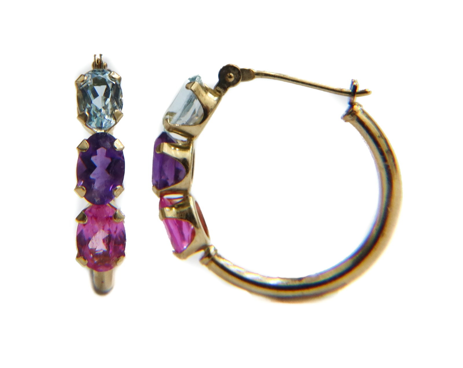 14k Yellow Gold Pink Sapphire Amethyst and Sky Blue Topaz Hoop Earrings: 14k Yellow Gold Pink Sapphire Amethyst and Sky Blue Topaz Hoop Earrings. Oval cut pink sapphires, amethysts, and sky blue topaz to each hoop. Tests for 14k gold. Weight Approx., 1.66 grams Measures Ap