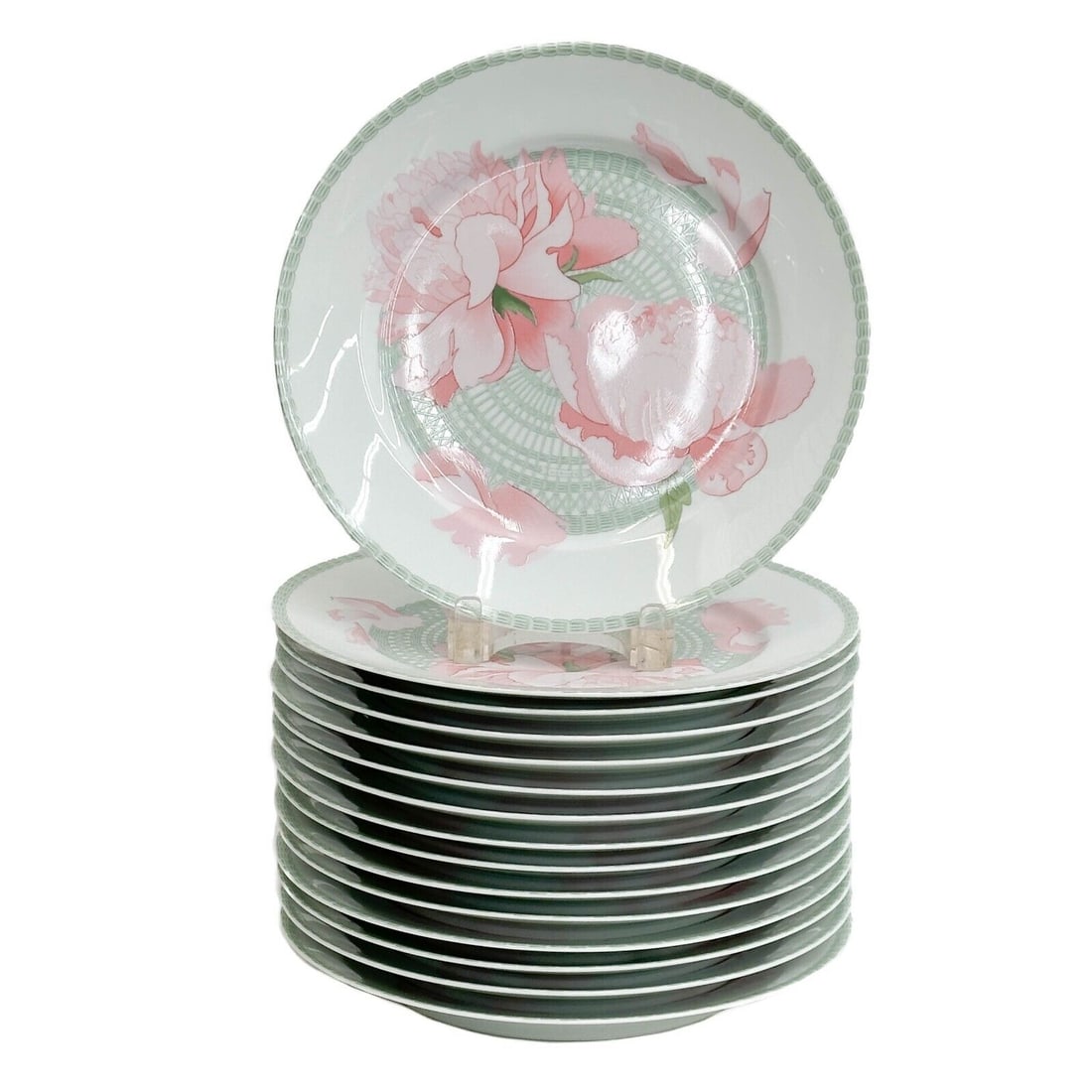 15 Hermes France Porcelain Large Dinner Plates in Les Pivoines Pink 10.8 inches: 15 Hermes France Porcelain Large Dinner Plates in Les Pivoines. A white ground with ornate green basketweave decoration, pink flowers. Underside with Hermes marks. Weight Approx., 20.5 lbs Measures Ap