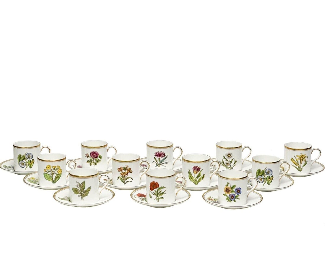 12 Royal Worcester England Williamson Floral Porcelain Demitasse Cup & Saucers: 12 Royal Worcester England Floral Porcelain Demitasse Cup & Saucers, 1968. A white ground, each cup with a hand painted flower to the front, matching saucer. Gilt to the rims. Royal Worcester marks to